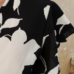 Flower Jurk Midi Zwart Wit 11 Flower Jurk Midi Zwart Wit -Exporteren Dames Glam Winkel Midi Overslag Jurk Flower Zwart Wit close 586x900 1